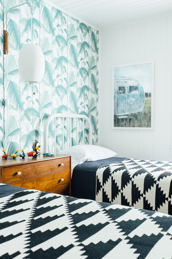 Kids' bedroom - coastal gender-neutral kids' bedroom idea in Charleston with white walls