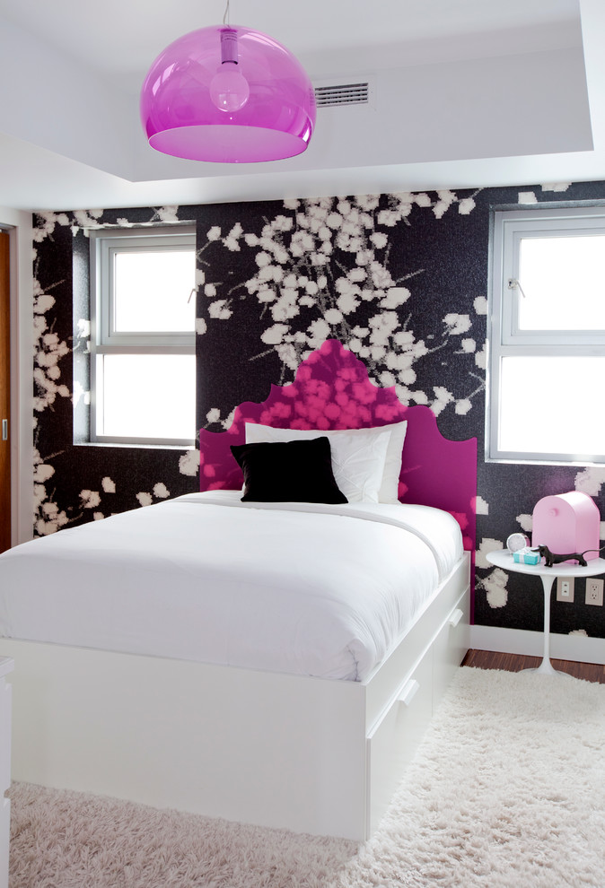 This is an example of a contemporary kids' bedroom in Vancouver with multi-coloured walls.