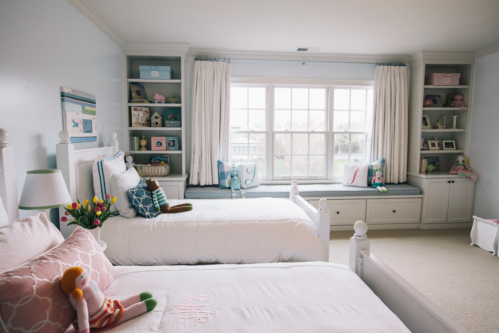 Inspiration for a timeless gender-neutral carpeted kids' bedroom remodel in Chicago with blue walls