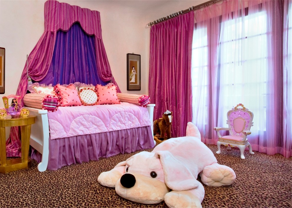 Kids' room - large traditional girl carpeted kids' room idea in Houston with pink walls