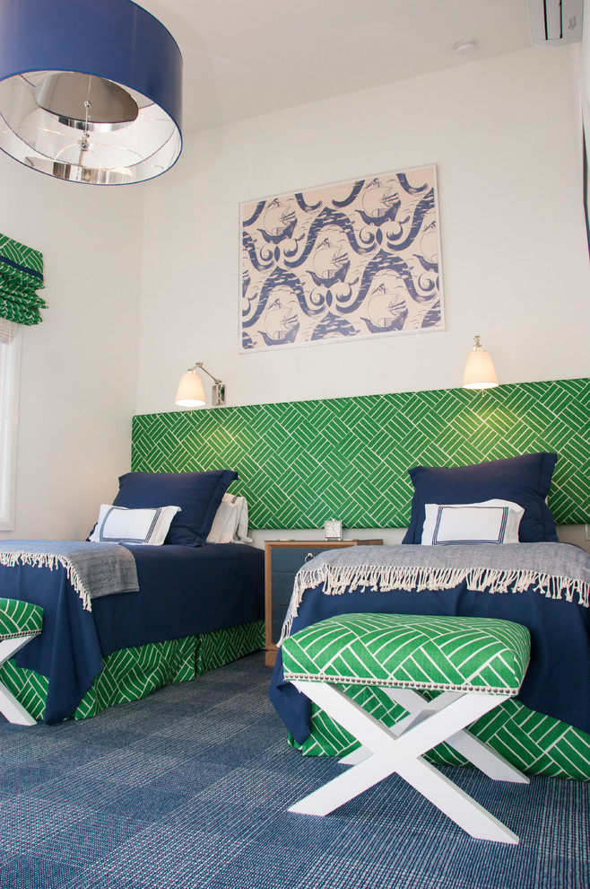 Mid-sized beach style boy carpeted and blue floor kids' room photo in Other with white walls