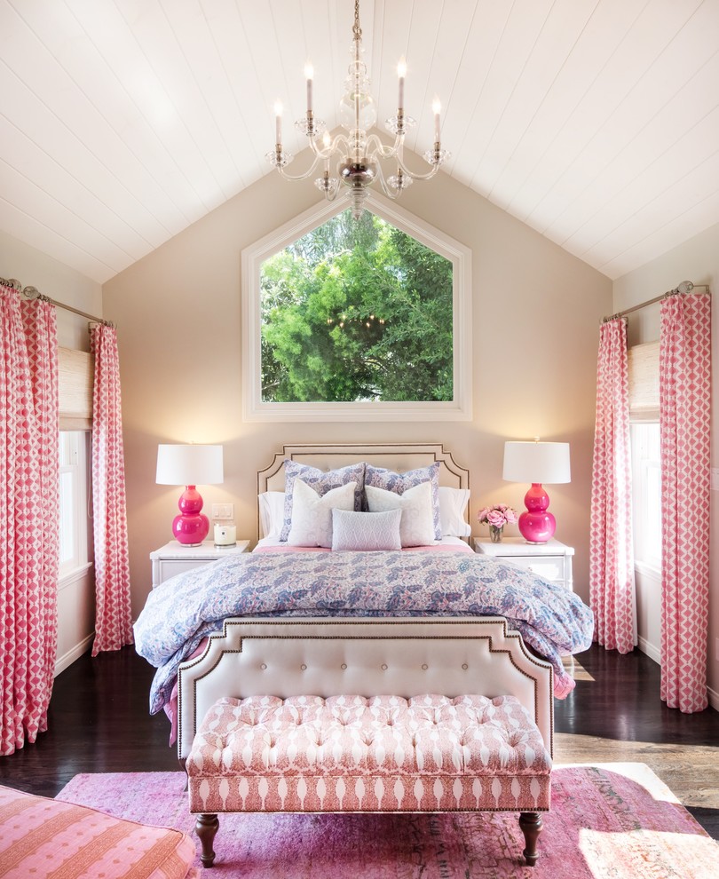 Example of a classic girl dark wood floor and brown floor kids' room design in Los Angeles with beige walls