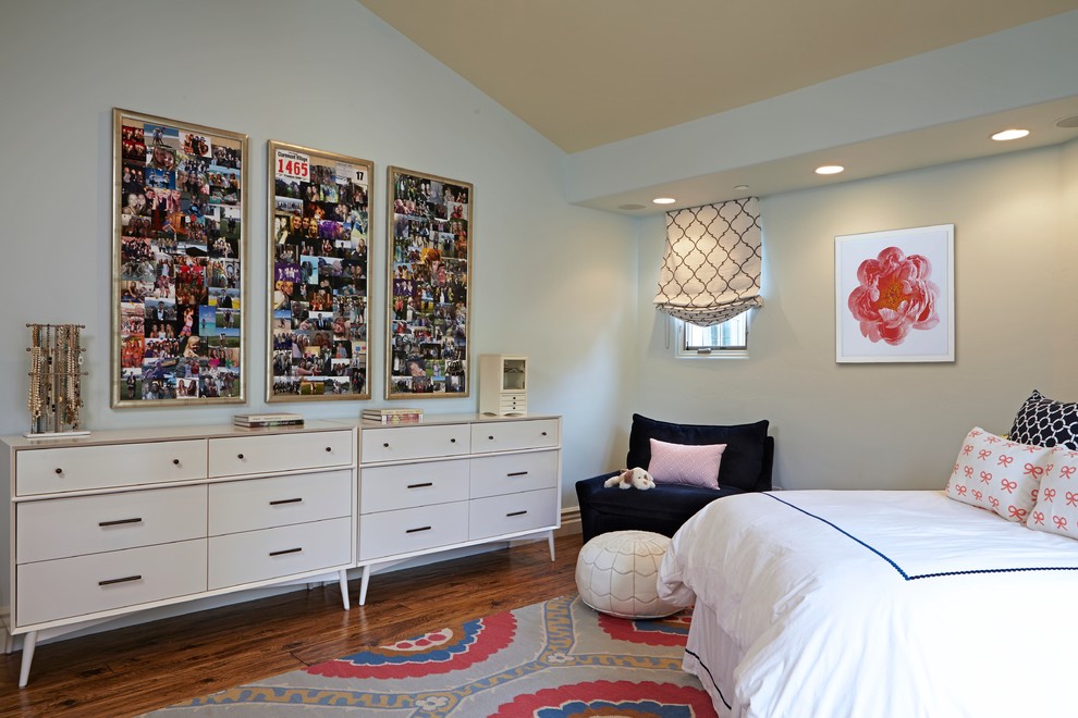 Large transitional girl dark wood floor kids' room photo in Los Angeles with blue walls