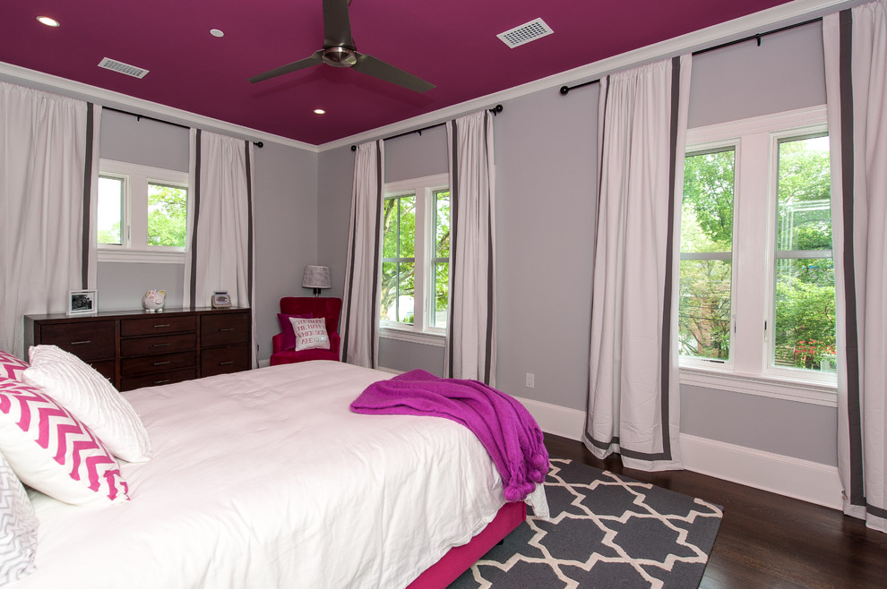 Photo of a medium sized contemporary children’s room for girls in DC Metro with grey walls and dark hardwood flooring.