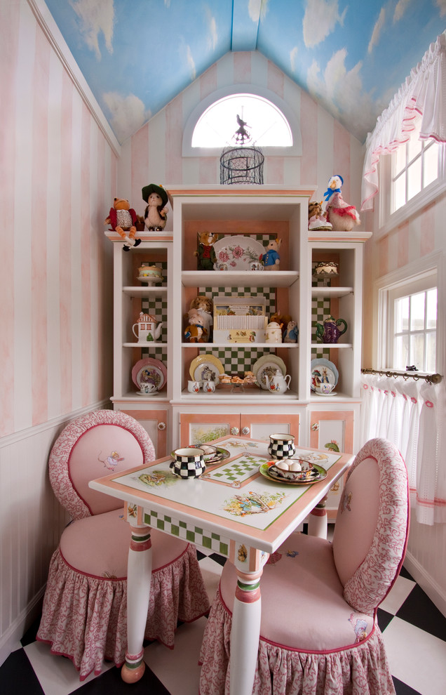 Elegant kids' room photo in Cleveland with multicolored walls