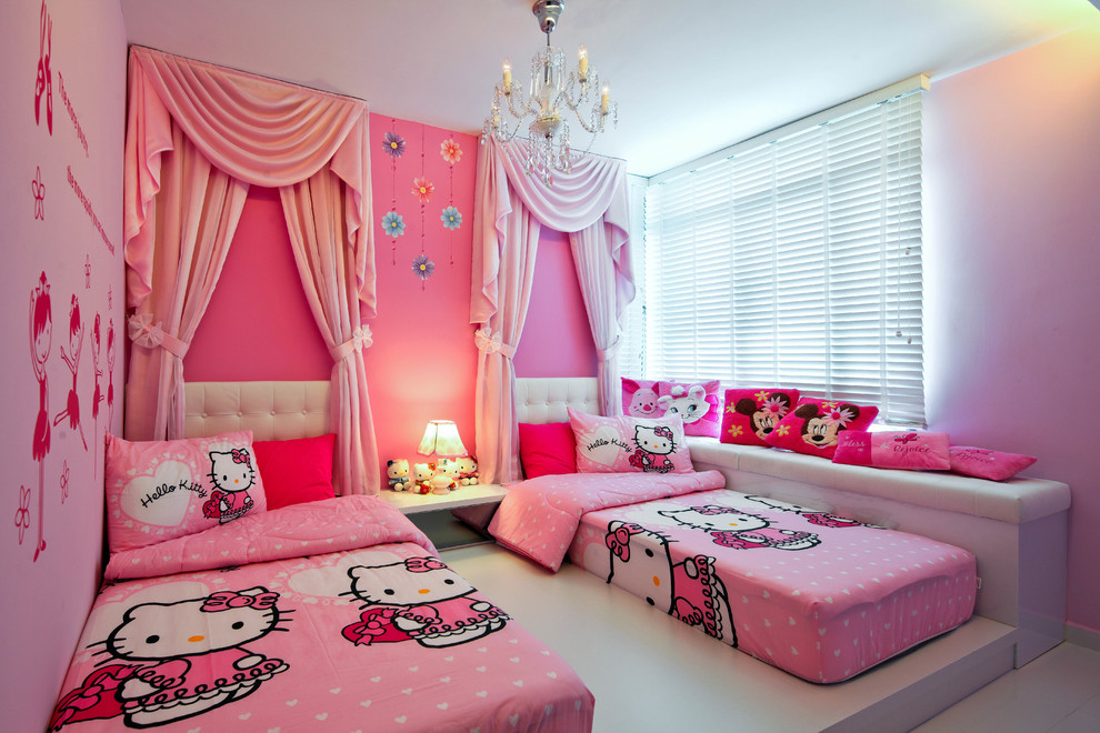 На фото: детская в современном стиле с спальным местом и розовыми стенами для ребенка от 4 до 10 лет, девочки