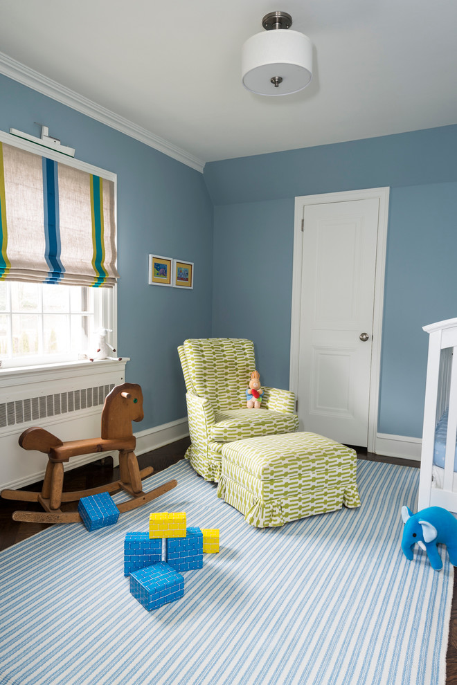 Example of a large transitional dark wood floor and brown floor kids' bedroom design in Philadelphia with blue walls