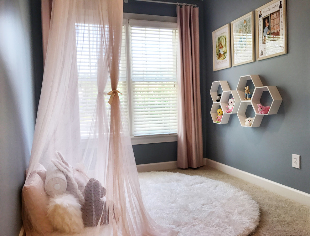 Inspiration for a transitional girl brown floor kids' room remodel in Raleigh