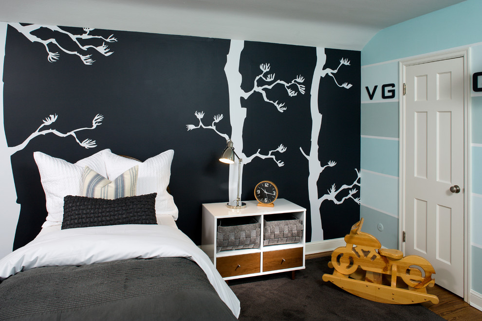 Photo of a contemporary children’s room for boys in Minneapolis with dark hardwood flooring and multi-coloured walls.