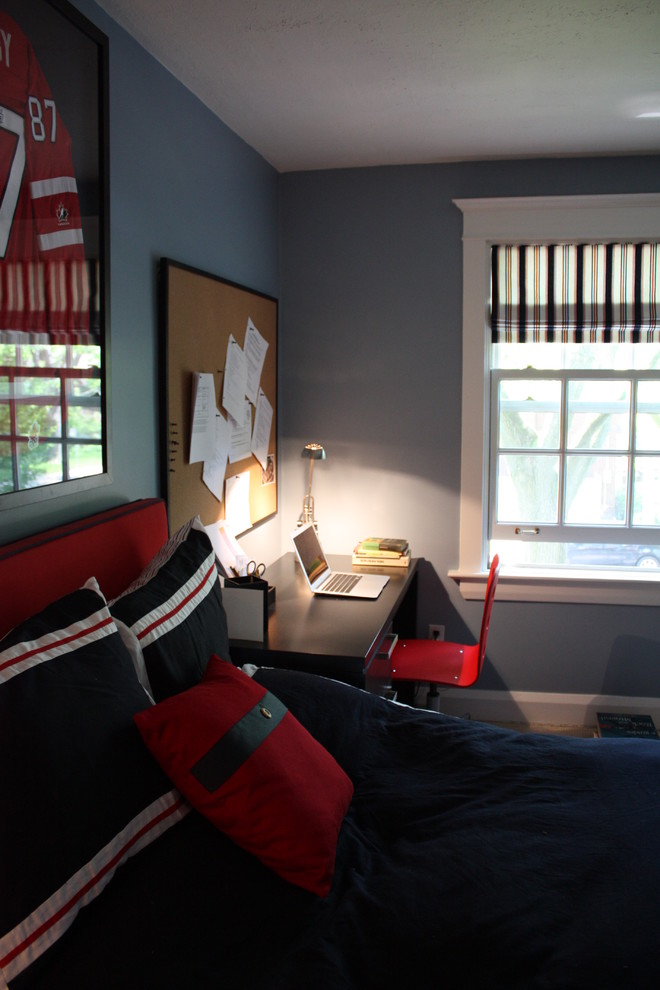 Imagen de dormitorio infantil actual de tamaño medio con paredes azules