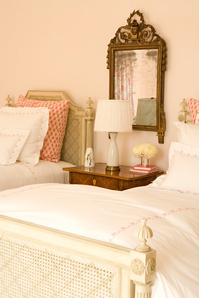 This is an example of a romantic children’s room for girls in Los Angeles with beige walls.