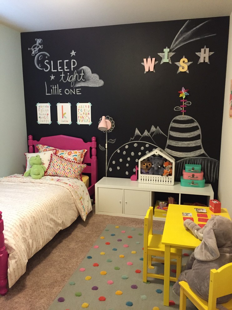 Medium sized classic children’s room for girls in Seattle with multi-coloured walls and carpet.
