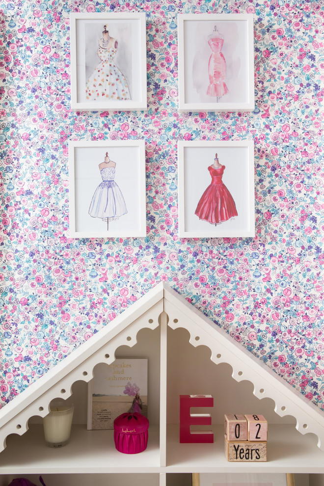 Mid-sized elegant girl carpeted kids' room photo in Los Angeles with pink walls