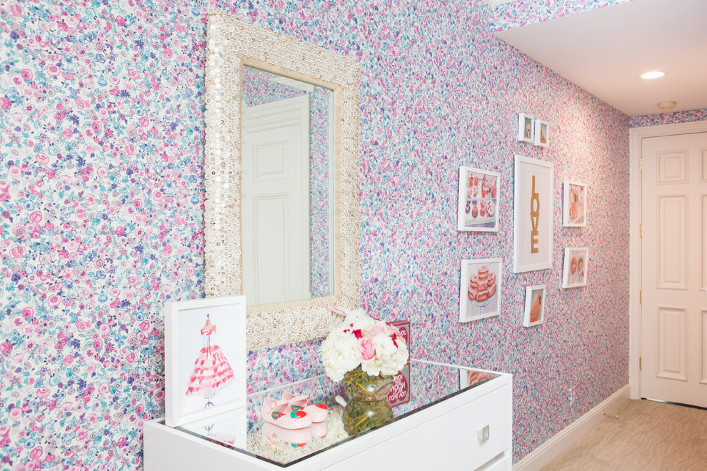 Mid-sized elegant girl carpeted kids' room photo in Los Angeles with pink walls