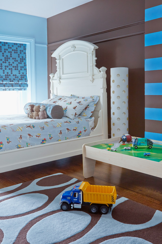 Kids' room - transitional boy dark wood floor kids' room idea in New York with multicolored walls