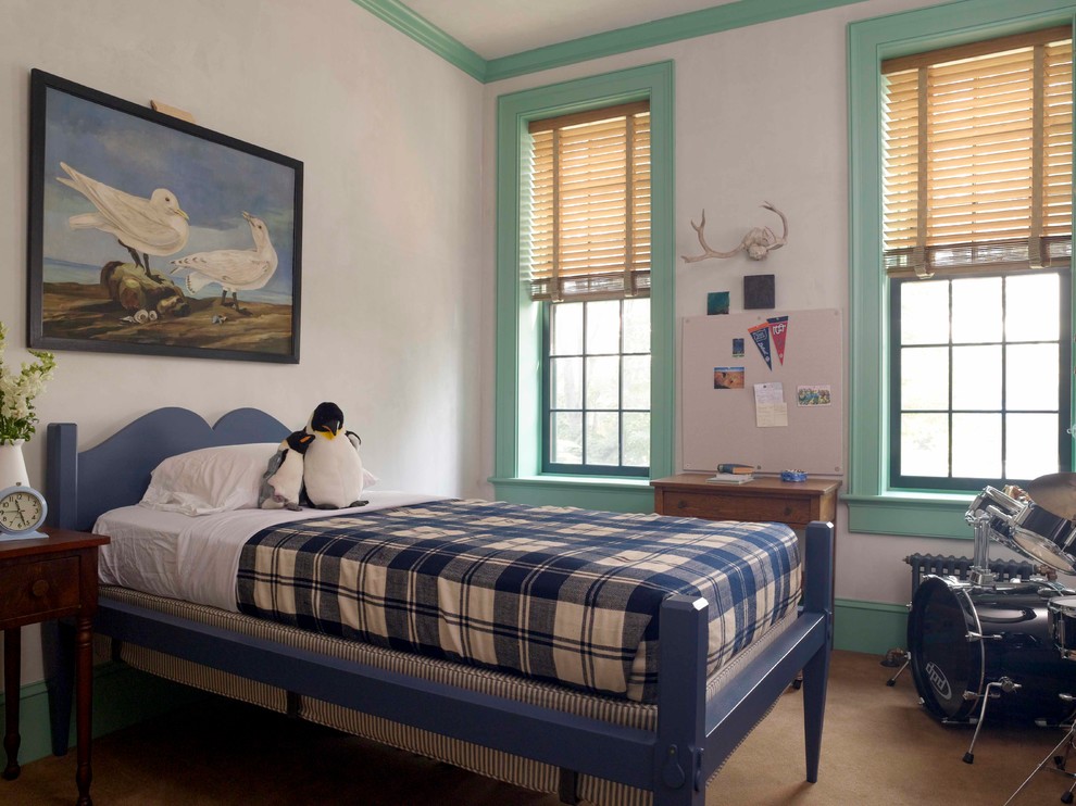 This is an example of a classic kids' bedroom in New York with white walls.