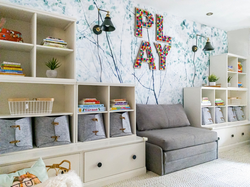 Mid-sized minimalist gender-neutral carpeted and beige floor kids' room photo in New York with multicolored walls