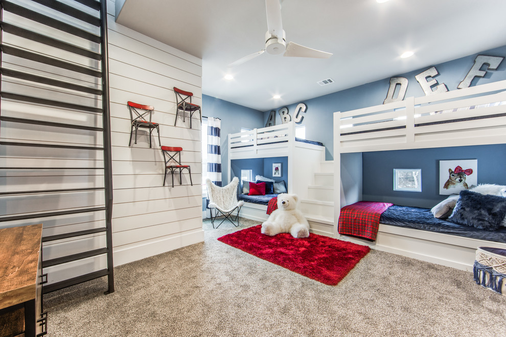 Example of a large farmhouse boy carpeted and beige floor kids' room design in Dallas with blue walls