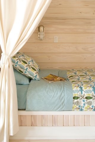This is an example of a beach style kids' bedroom in Birmingham.