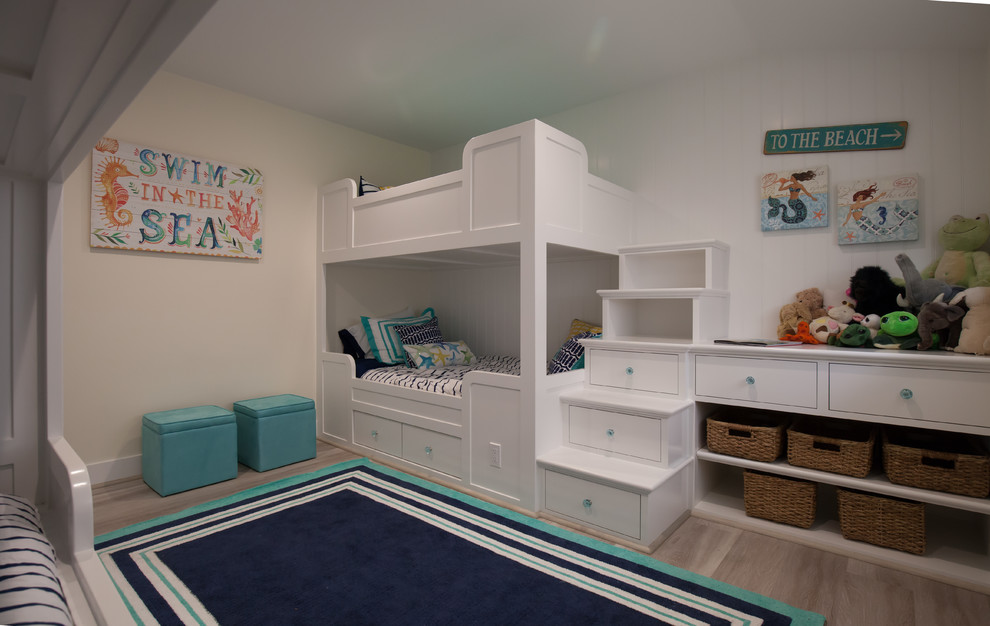 Inspiration for a medium sized beach style kids' bedroom in Los Angeles with light hardwood flooring and white walls.