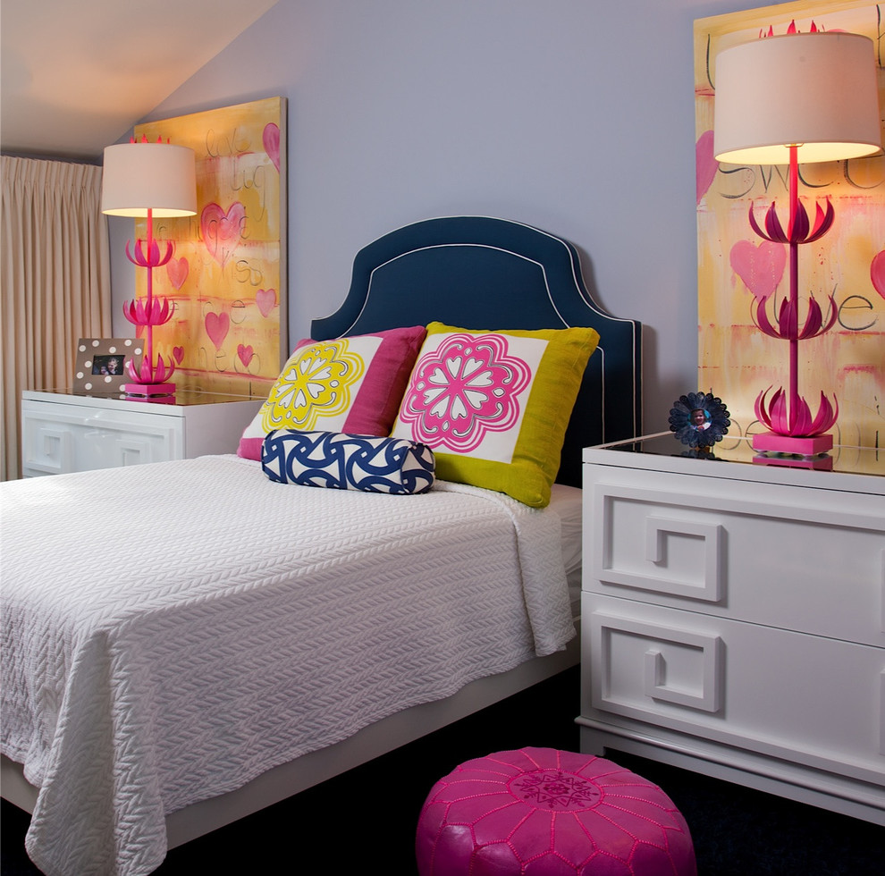 Inspiration for a traditional teen’s room for girls in San Diego with blue walls and black floors.