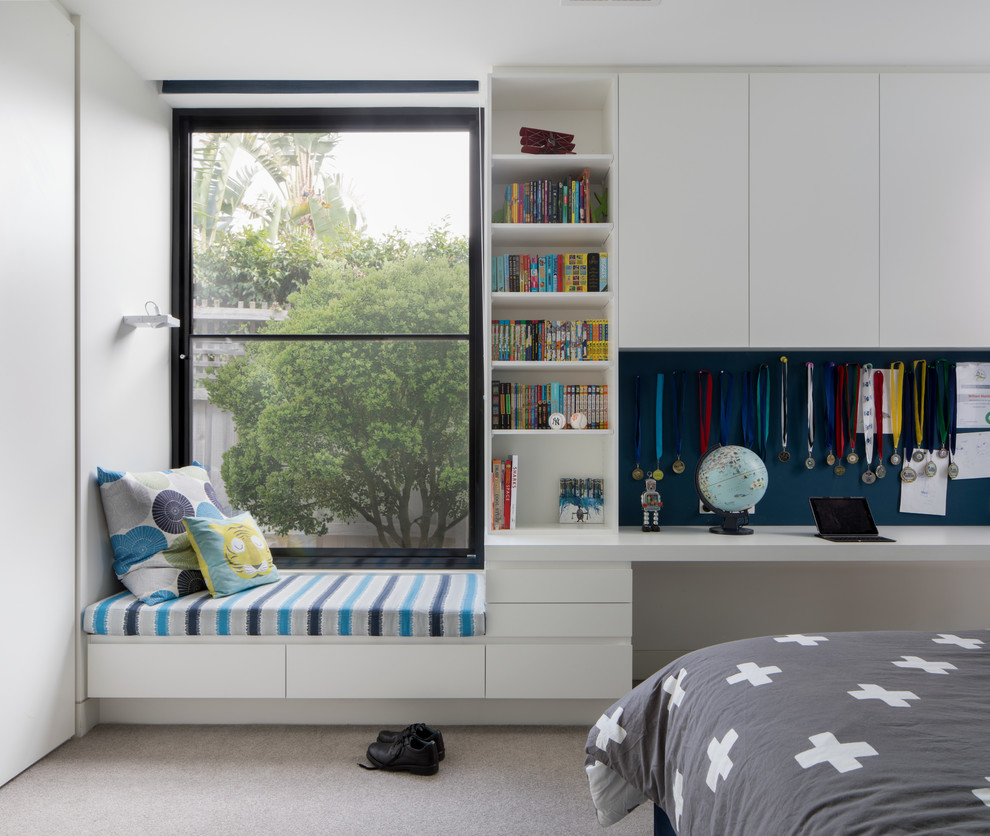 На фото: большая детская в стиле модернизм с белыми стенами, ковровым покрытием, спальным местом и серым полом для подростка, мальчика