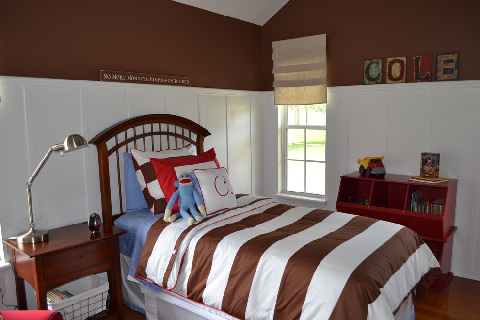 This is an example of a traditional kids' bedroom in Other with multi-coloured walls.