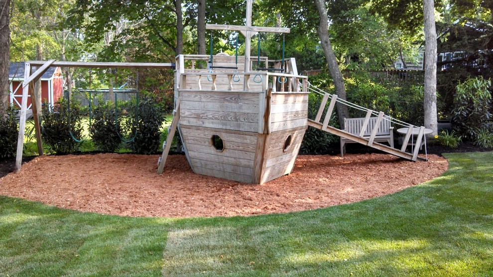 Example of a mid-sized beach style kids' room design in New York