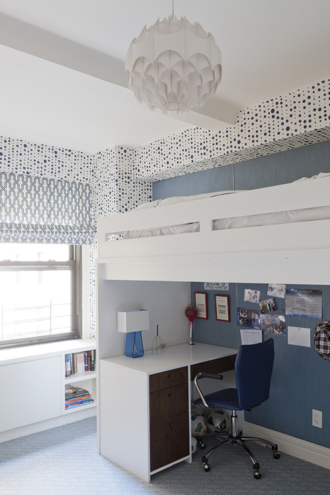 Trendy boy carpeted kids' room photo in New York with multicolored walls