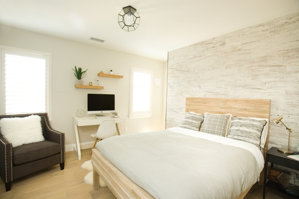 Example of a mid-sized trendy girl light wood floor kids' room design in Los Angeles with white walls