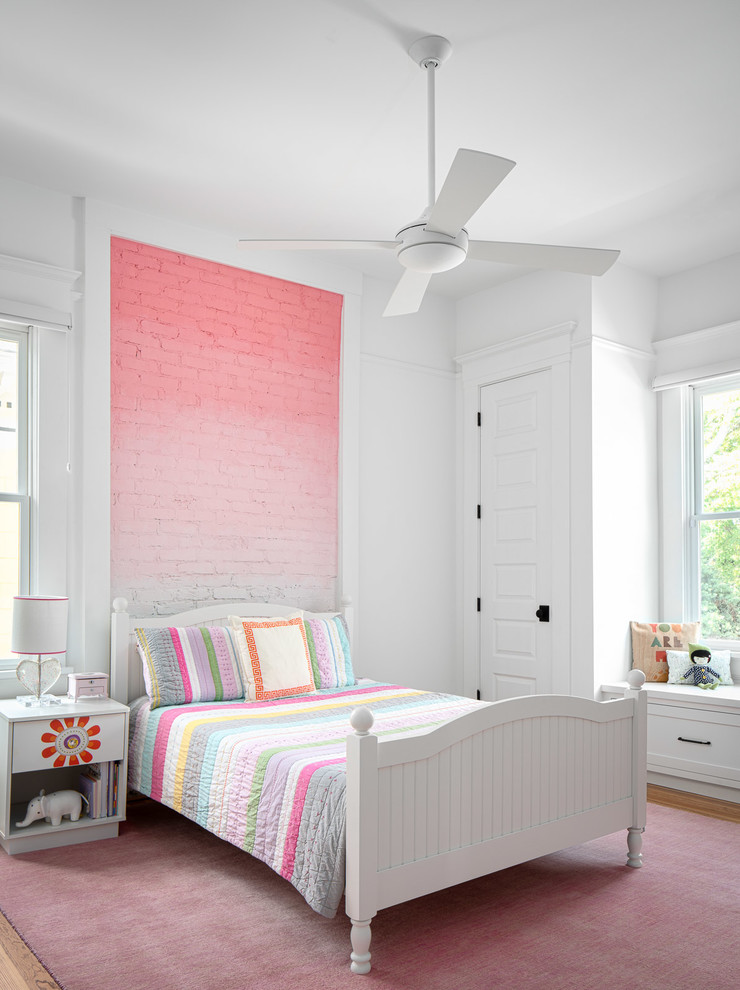 Large traditional children’s room for girls in Atlanta with white walls and a feature wall.