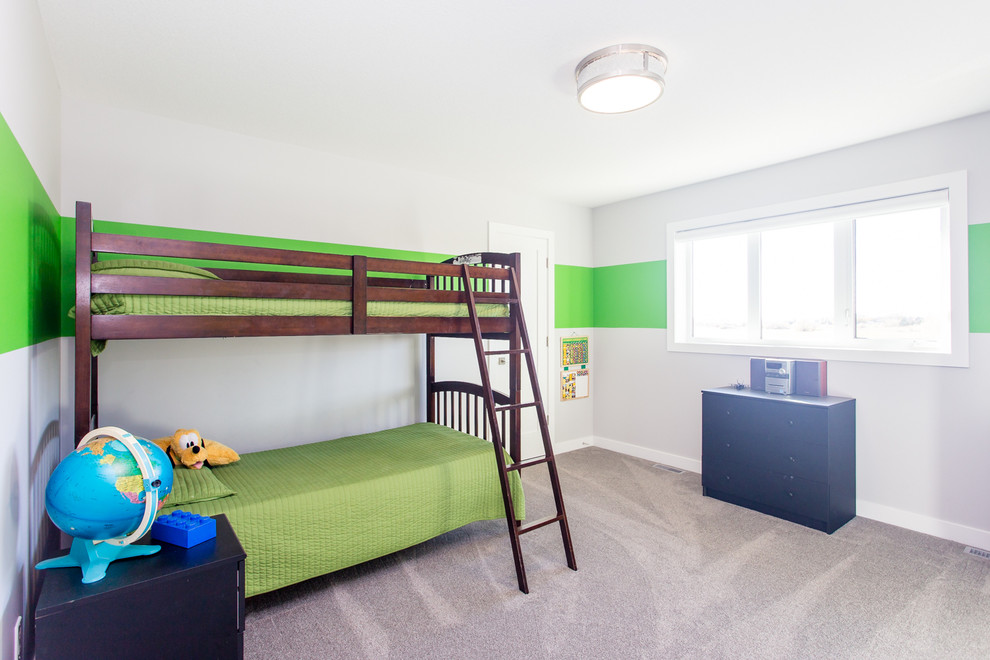 Design ideas for a medium sized classic gender neutral children’s room in Calgary with green walls and carpet.