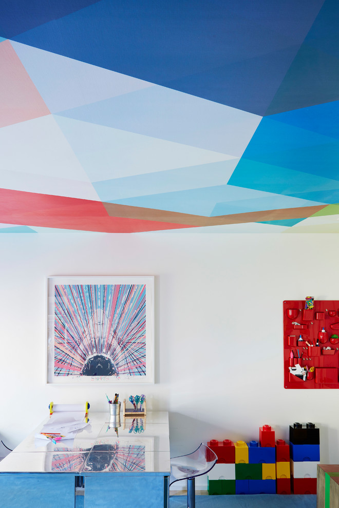 Inspiration for a contemporary gender-neutral blue floor playroom remodel in New York with white walls