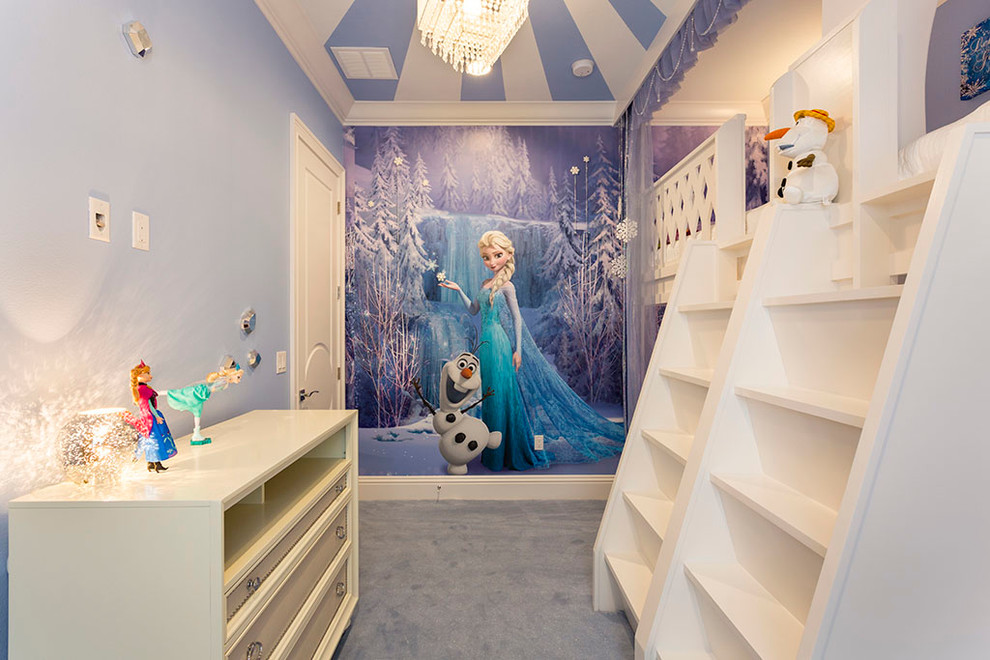 Photo of a medium sized eclectic children’s room for girls in Orlando with blue walls, carpet, beige floors and wallpapered walls.