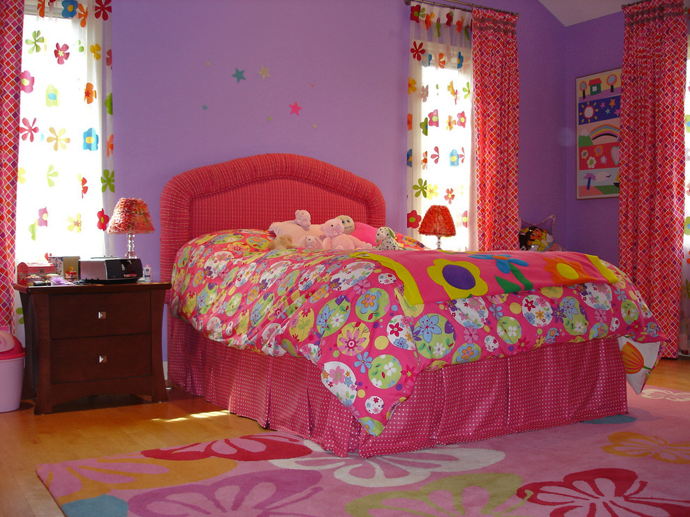 Kids' room - mid-sized eclectic girl light wood floor kids' room idea in Chicago with purple walls