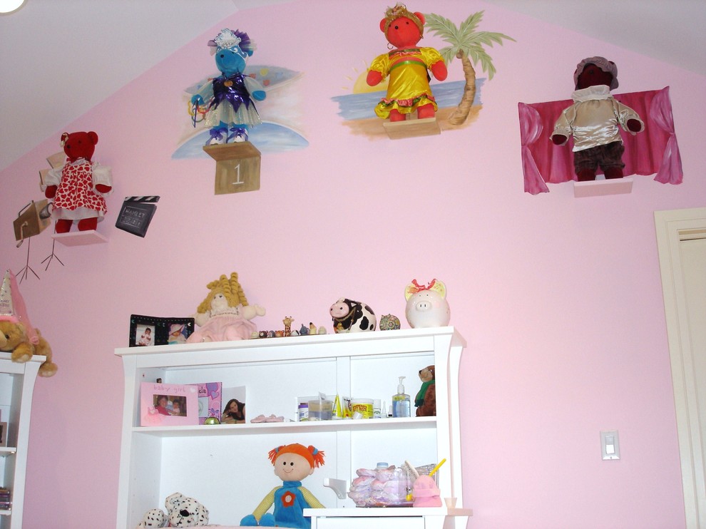 Mid-sized eclectic girl light wood floor kids' room photo in Chicago with pink walls