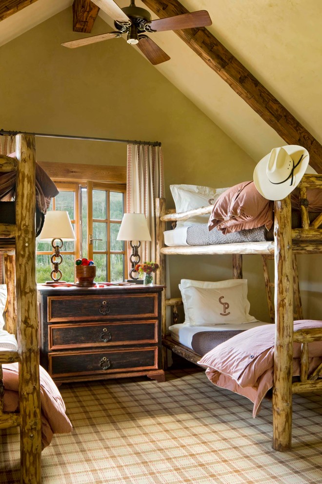 Inspiration for a rustic gender neutral kids' bedroom in New York with yellow walls.