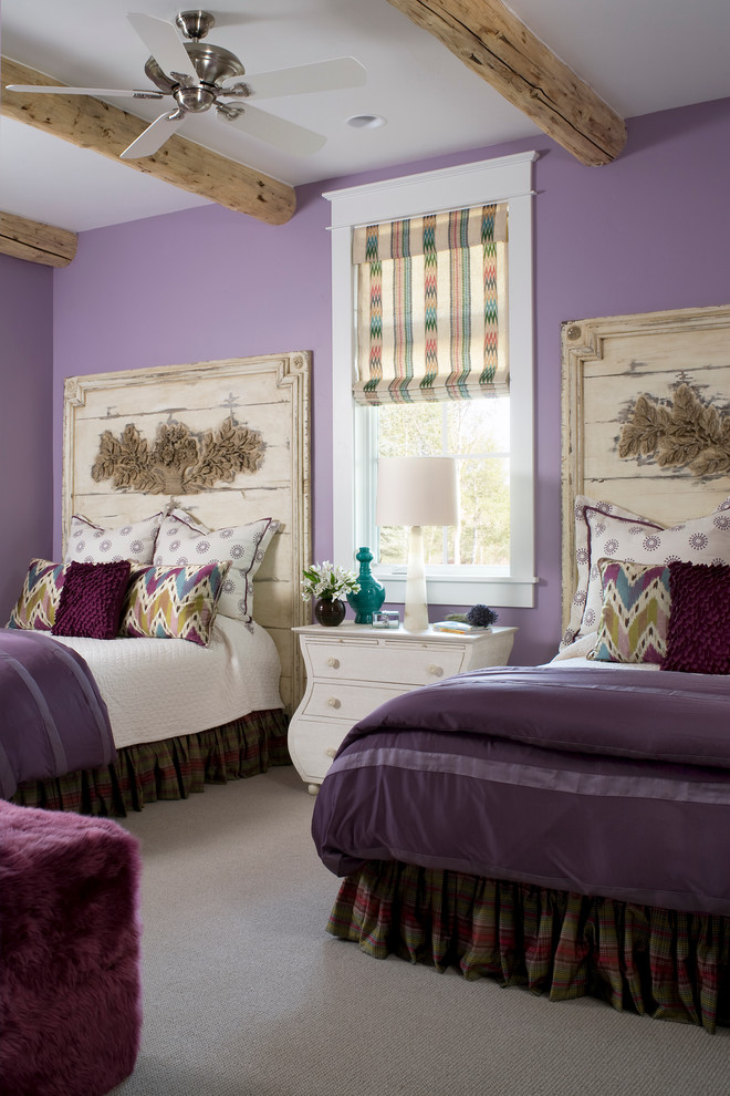 Rustic kids' bedroom for girls in Denver with purple walls and carpet.
