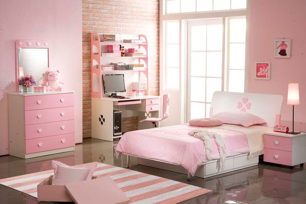 Inspiration for a large contemporary children’s room for girls in Atlanta with pink walls.