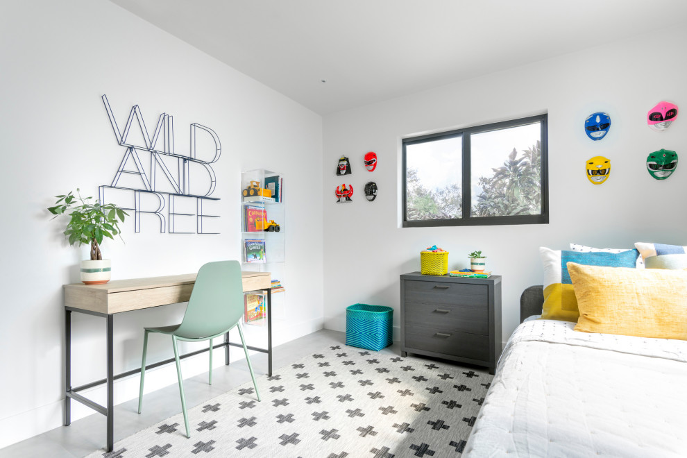 Design ideas for a contemporary children’s room for boys in Miami with white walls and grey floors.