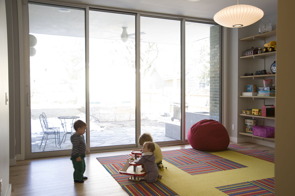 Example of a minimalist kids' room design in Charlotte
