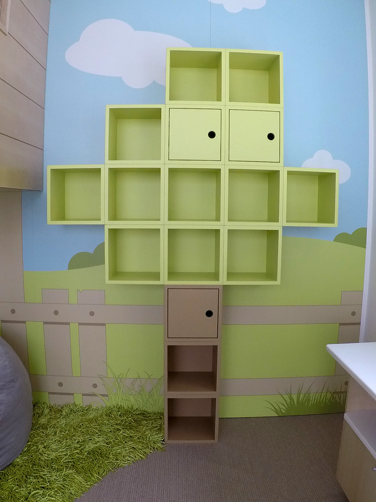 Photo of a small contemporary gender neutral kids' bedroom in DC Metro with white walls, carpet and beige floors.