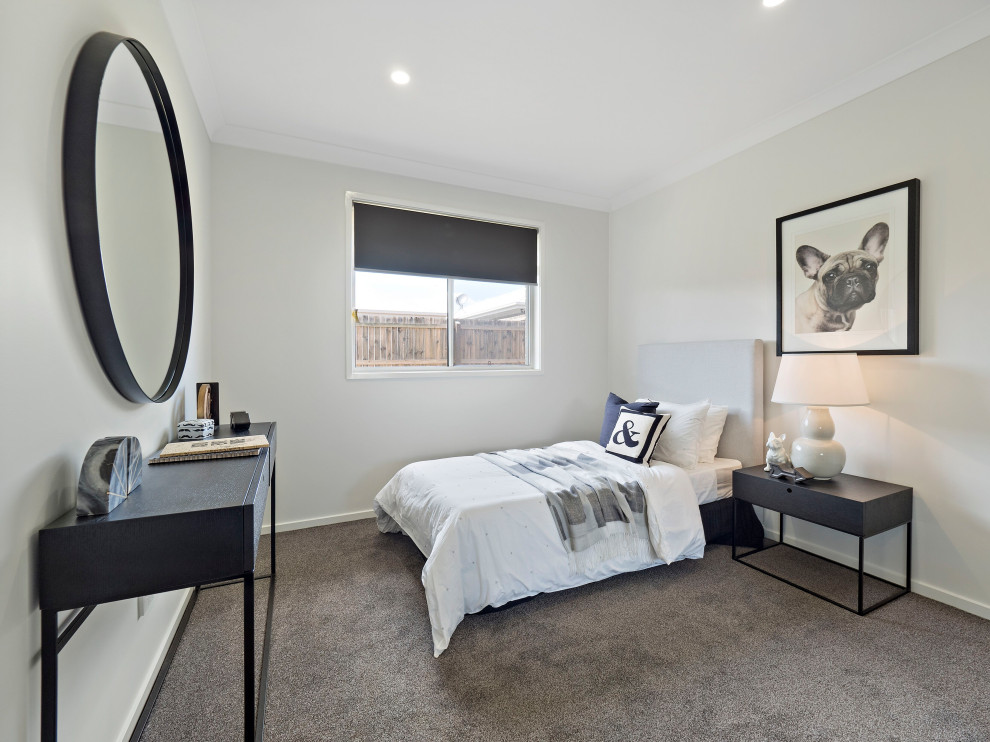 Photo of a medium sized contemporary teen’s room for girls in Brisbane with grey walls, carpet and grey floors.