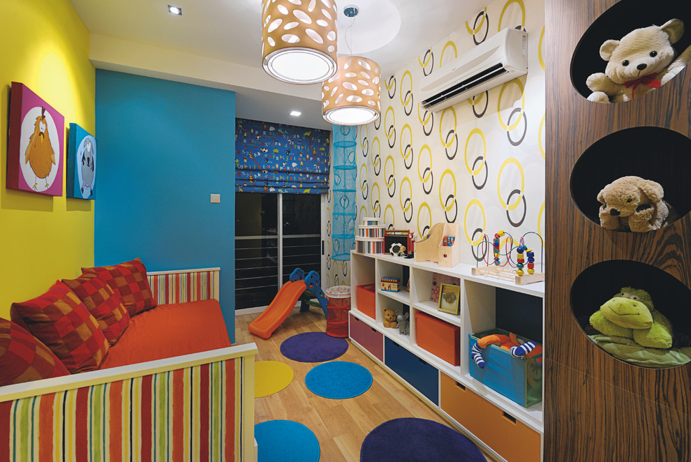 Trendy kids' room photo in Other with multicolored walls