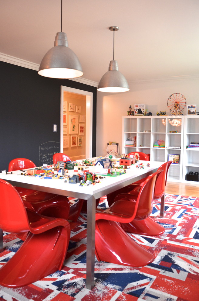 Kids' room - contemporary gender-neutral kids' room idea in New York with black walls
