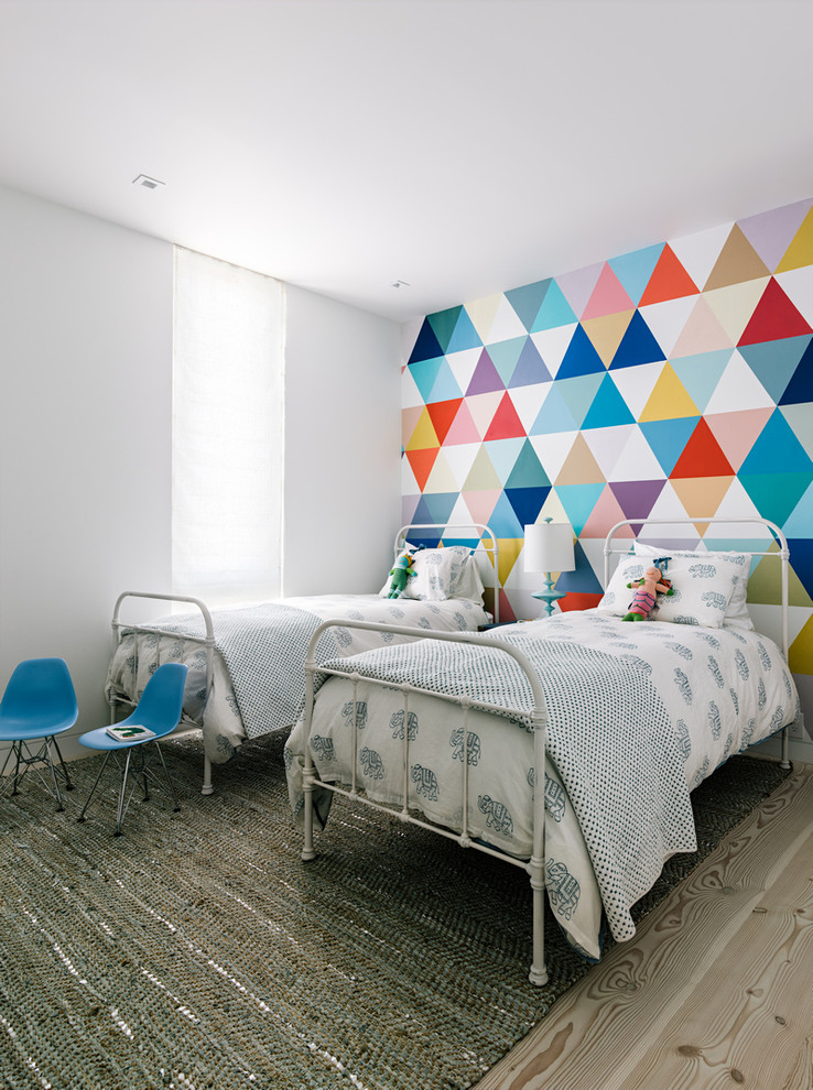 Inspiration for a contemporary gender-neutral light wood floor kids' room remodel in San Francisco with multicolored walls