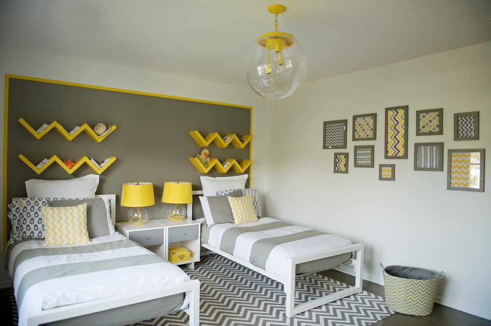 Inspiration for a contemporary gender-neutral dark wood floor kids' room remodel in New York with multicolored walls