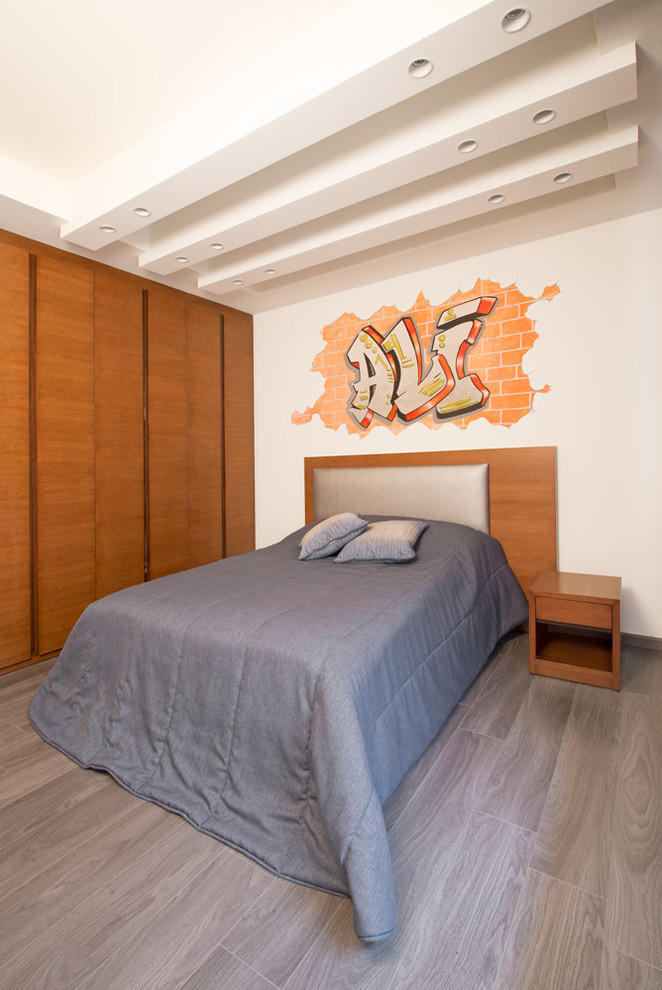 Kids' bedroom - contemporary dark wood floor kids' bedroom idea in Other with white walls