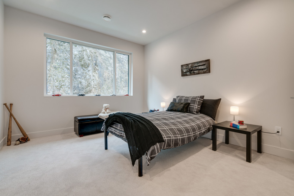 Mittelgroßes Modernes Jungszimmer mit Schlafplatz, weißer Wandfarbe, Teppichboden und grauem Boden in Vancouver