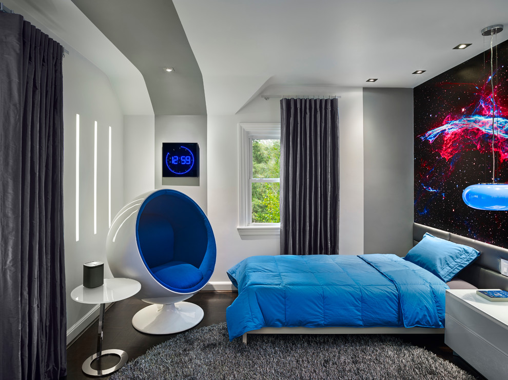Inspiration for a small contemporary teen’s room for boys in Philadelphia with multi-coloured walls and dark hardwood flooring.